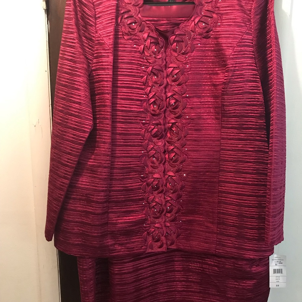 Beautiful 3piece cranberry suit by Moshita Couture